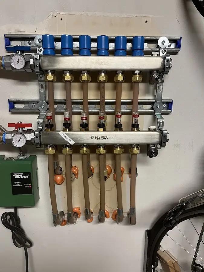 Plumber performing Leak Detection at a residential property in Huntington